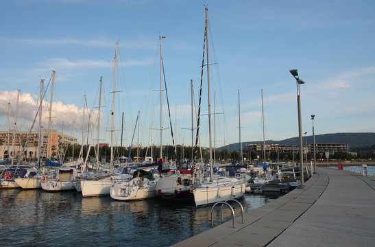 Motor boats and sailboats in harbor in Koper, Slovenia