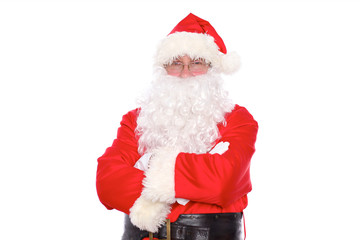 Kind Santa Claus standing with crossed arms, isolated on white background