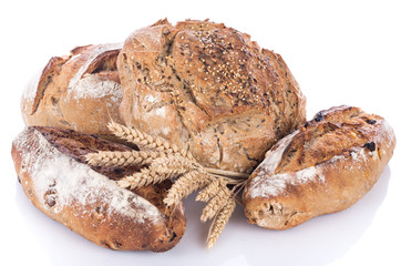 Fresh cereal breads with ears of wheat