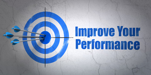 Studying concept: target and Improve Your Performance on wall background © Maksim Kabakou