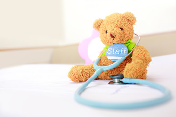 Teddy bear with stethoscope like doctor.