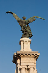 View of famous angel statue against blue sky at St. Peter's Basilica