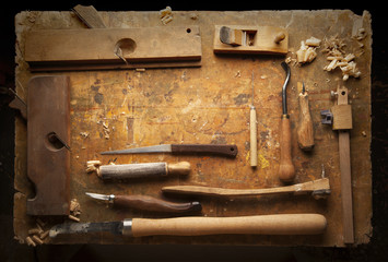 Hand tools Wood on an old wooden workbench