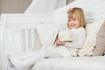 Happy girl with gift box.