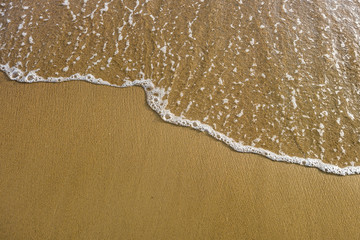 Sea and sand texture at the beach