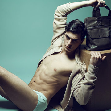 Men fashion concept. Handsome muscular male model in underwear