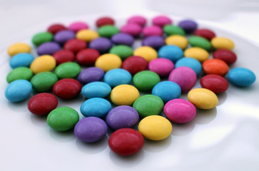 Group of many colorful tasty chocolate smarties