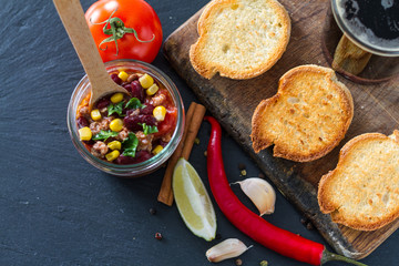 Chili con carne served on toast