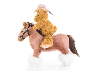 Fototapeta premium Cowboy Teddy bear riding a horse