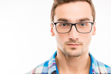 Handsome serious man with his glasses