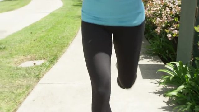 Fit young woman running