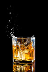 Fototapeta na wymiar splash of whiskey