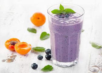 Glasses of smoothies with fresh berries