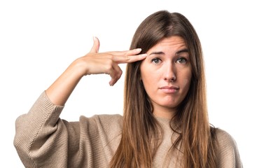 Girl making suicide gesture