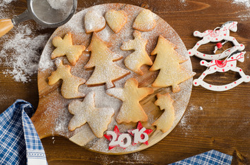 Fototapeta premium Homemade christmas cookies on wooden board.