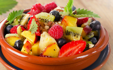 Healthy fruit salad with mint leaves