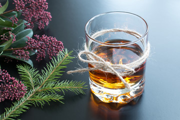 Whisky glass on black background 