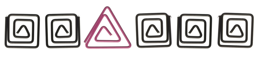 colored paperclips isolated on white.