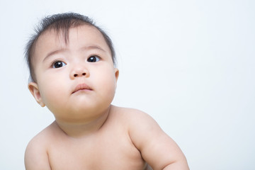 baby girl posed on background