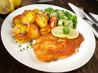 Hähnchenbrustschnitzel mit Bratkartoffeln