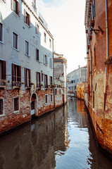 Fototapeta na wymiar Beautiful view of water street and old buildings in Venice