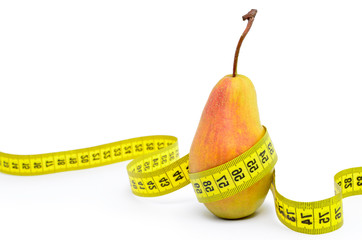 Slim pear wrapped in measuring tape on a white background