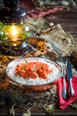 Tasty tikka masala with chicken in tomato sauce