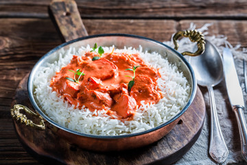 Delicious tikka masala with chicken in tomato sauce