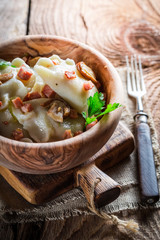 Tasty dumplings with mushrroms and onion