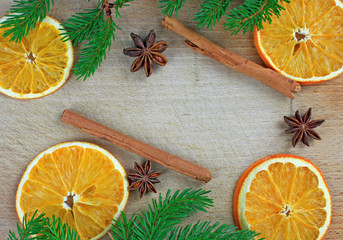 Christmas frame - cinnamon sticks, dried oranges and anise seeds
