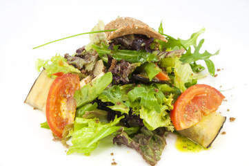 salad vegetables and goat cheese on a white background