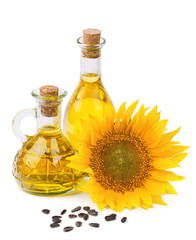 sunflower oil and seeds isolated on white