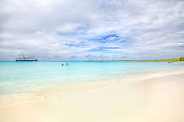 Fototapeta na wymiar The view of a beach on uninhabited island Half Moon Cay (The Ba