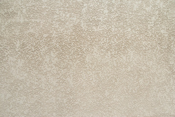 Fototapeta premium Decorative plaster wall with yellow structure as texture