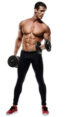 Fototapeta na wymiar Handsome power athletic man in training pumping up muscles with