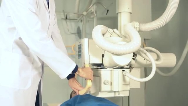 Doctor doing x-ray of hip