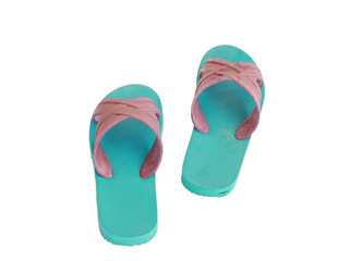 Green and blue rubber slippers on a white background