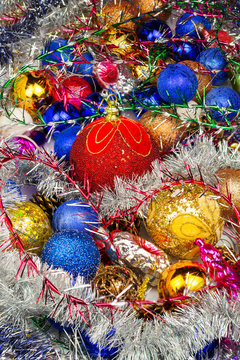 background made of christmas balls and tinsel