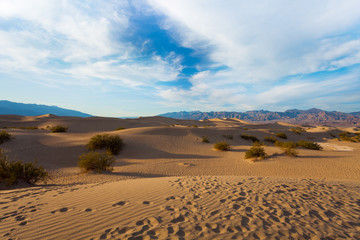 Sand dunes of the Death Valley in evening shadows