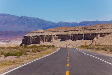 Road view with mountain in desert, California