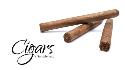 Three cigars on white