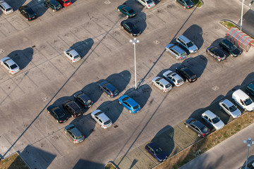 aerial view over parking lot near supermarket