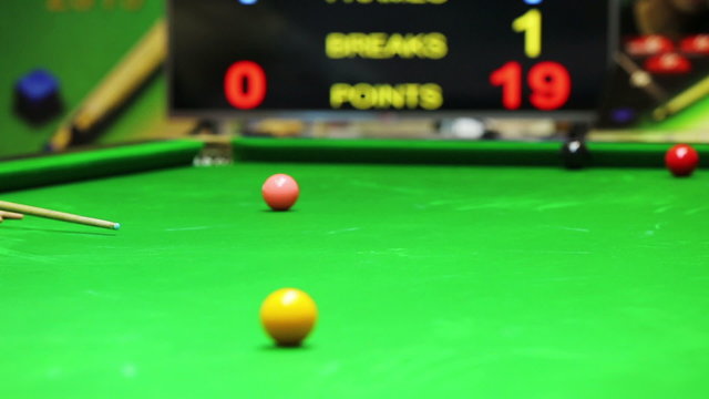snooker referee put blue ball on point
