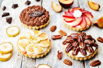 banana salted caramel chocolate plum honey pecan tartlets