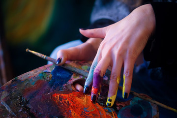Brush in a painter's hand