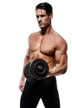 Muscular bodybuilder guy doing exercises with dumbbells