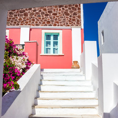 Stairs leading to colorful house on Santorini island, Greece
