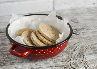 Homemade Scottish Oatcakes,  on bright wooden surface. Healthy food. Rustic style