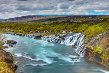 Panoramic view of the Hraunfossar waterfalls in Iceland