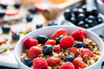 Bowl with fresh berries and cereal